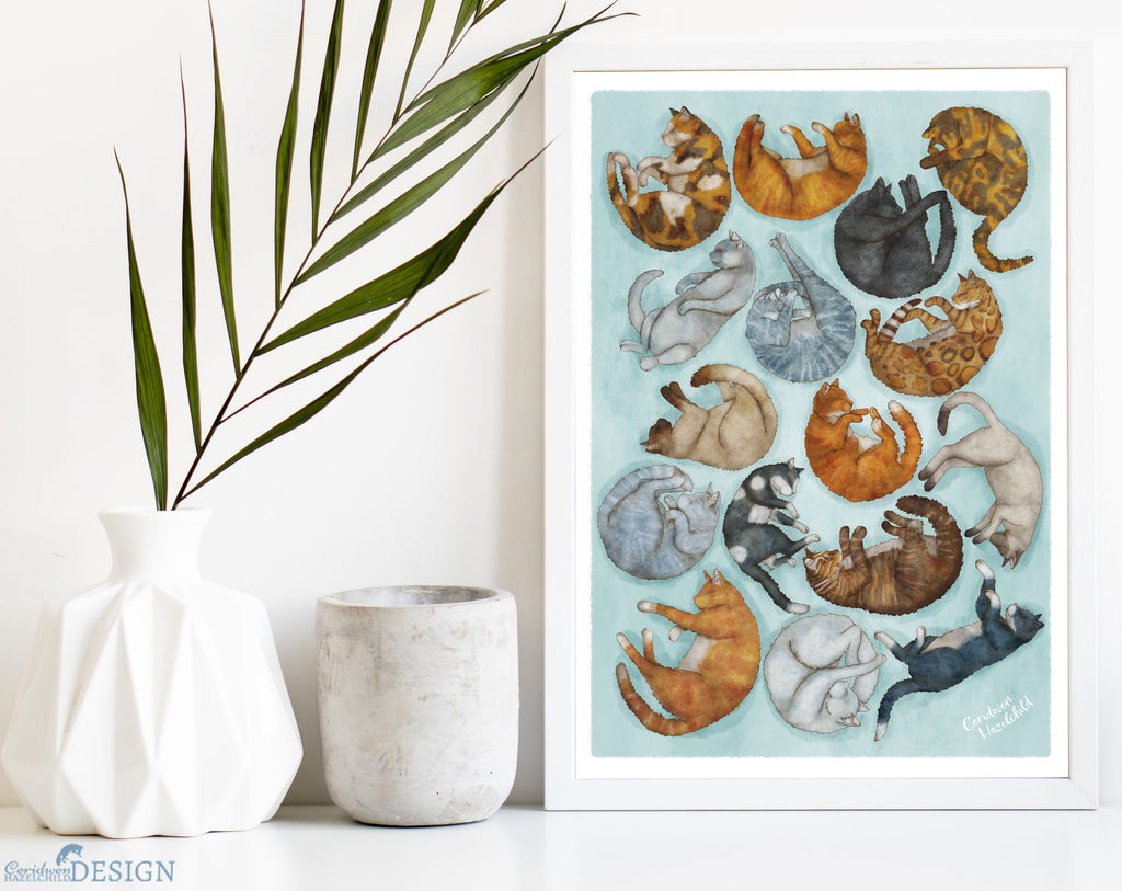 A framed print of an illustration of different sleeping cat breeds by Ceridwen Hazelchild.