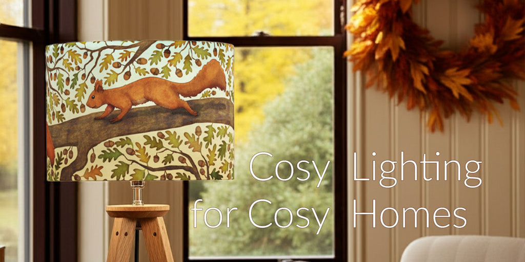 Decorative handmade lamp with a squirrel design in a cosy autumnal home setting with text 'Cosy Lighting for Cosy Homes'.